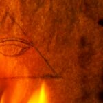 Illuminati Symbol on Old Paper Burning